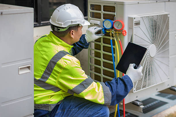 Professional Air Conditioning Repair technician working in Lansing, WV